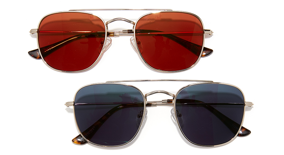 Two pairs of aviator sunglasses, one with red lenses and one with dark blue lenses, and gold frames.