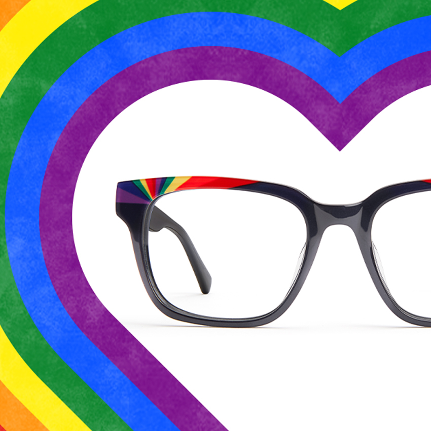 Colorful eyeglass frame with rainbow stripes and a heart-shaped rainbow background.